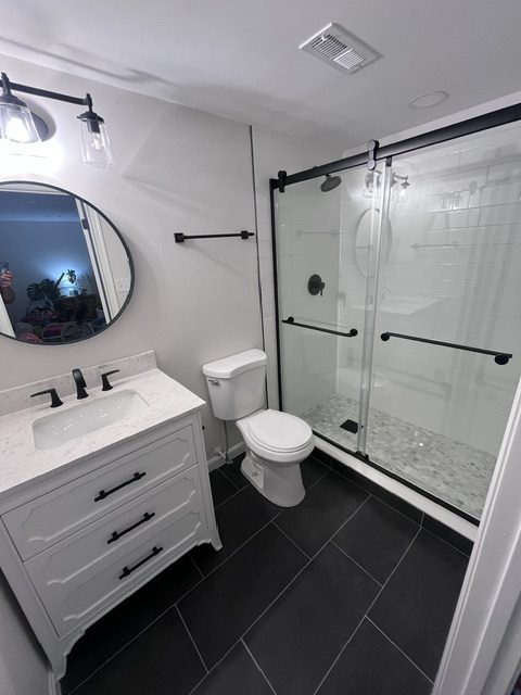 Clean bathroom and glass shower after deep cleaning in a Bel Air MD home